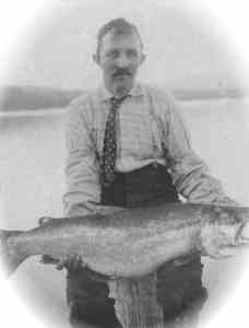 Chris Nelson, with his catch, a 23 lb. Tahoe Trout 