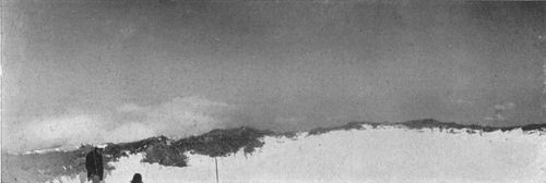 These views show the larger of the two comparatively modern and small craters on the broad platform left by the explosion which decapitated the Peak.