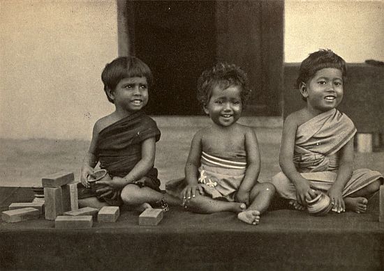 SEELA IS THE BABY IN THE MIDDLE. She slipped into the picture at the last moment, and so was caught unawares. Mala is to the right; Nullinie to the left. (This little one's left hand and foot are partially paralyzed through drugging in infancy.)