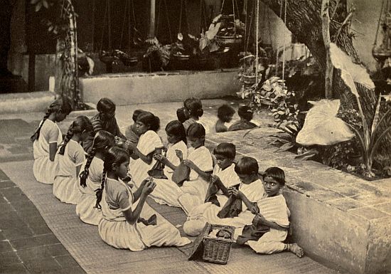 SEWING-CLASS IN THE COURTYARD.