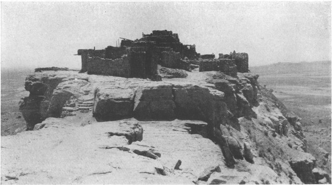 The Moki Indian pueblo of Walpi, in northeastern Arizona, stands on a mesa high above the plain