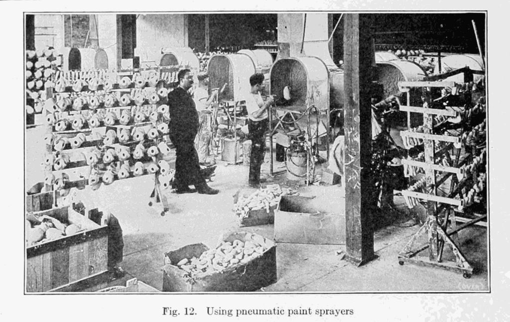 Fig. 12. Using pneumatic paint sprayers