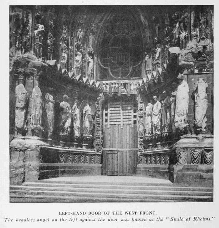 LEFT-HAND DOOR OF THE WEST FRONT The headless angel on the left against the door was known as the "Smile of Rheims."