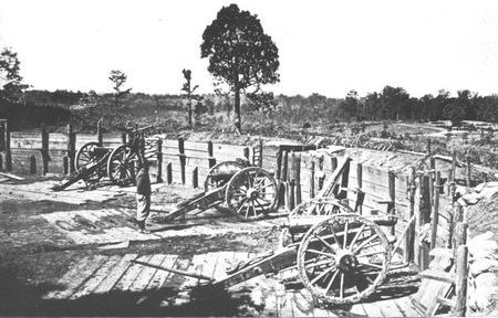 Confederate sappers constructed a number of artillery emplacements covering the avenues of approach to Atlanta. The guns in this fortification overlook famous Peachtree Street.