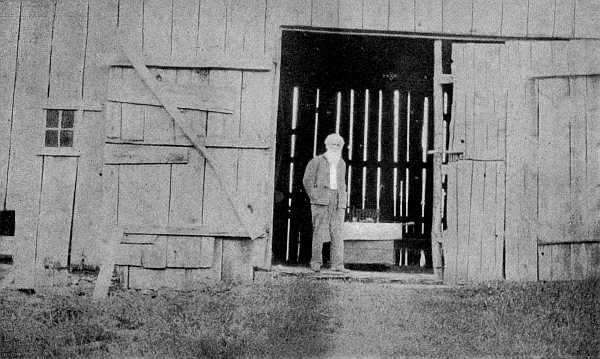 BURROUGHS IN THE OLD BARN IN WHICH HE DOES HIS WRITING