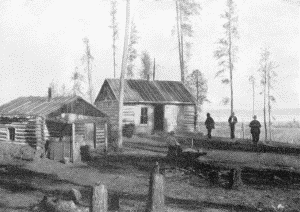 a. Trader's store at the village of the Pillagers, Cass Lake in the distance on the right. November 26, 1899