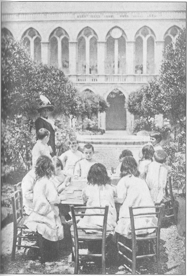 THE CLOISTER SCHOOL OF THE FRANCISCAN NUNS IN ROME Children playing a game with tablets of coloured silk