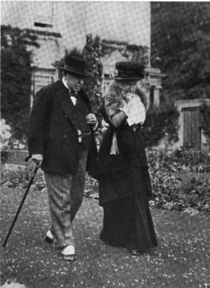 MRS. WARD AND HENRY JAMES IN THE GARDEN AT STOCKS FROM A PHOTOGRAPH BY MISS DOROTHY WARD