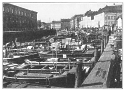 FISHING BOATS CROWD THE CANALS