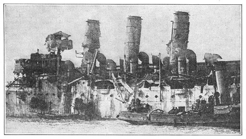 THE BRITISH CRUISER VINDICTIVE AS IT LOOKED AFTER THE FIGHT AT ZEEBRUGGE; LATER IT WAS SUNK IN THE HARBOR AT OSTEND TO BLOCK THE CHANNEL