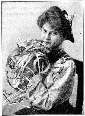 photo of girl whole hands full of curling basket slats