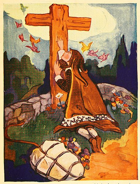 Christian kneeling at cross, bundle beside him