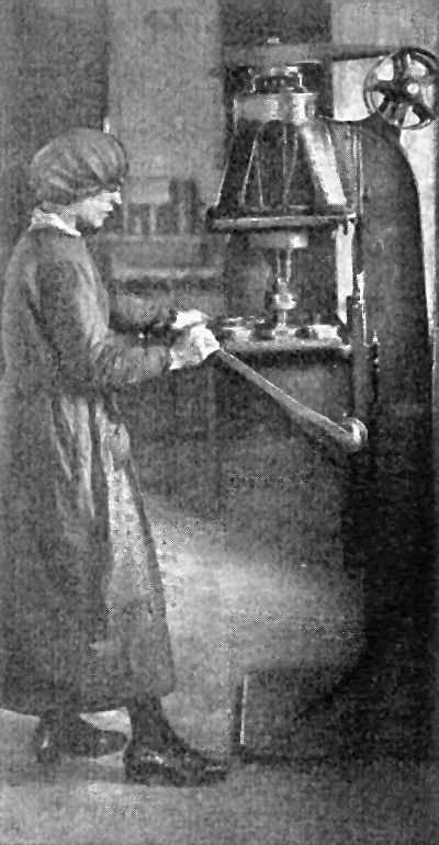 A Woman     Operating a Multiple Spindle Drill in an English Shell Factory.