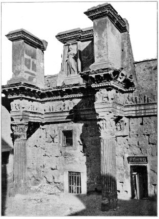 PART OF THE BOUNDING WALL OF THE FORUM OF NERVA (FORUM TRANSITORIUM) ROME: THE MODERN LEVEL AT LEAST TWENTY FEET ABOVE ANCIENT PAVEMENT. 