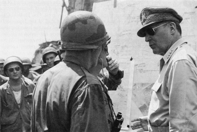 GENERAL MacARTHUR AND MAJ. GEN. ARCHIBALD V. ARNOLD at Headquarters, 7th Division.