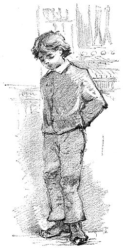 Boy standing with hands behind back