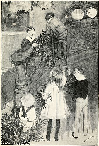 four children decorating staircase