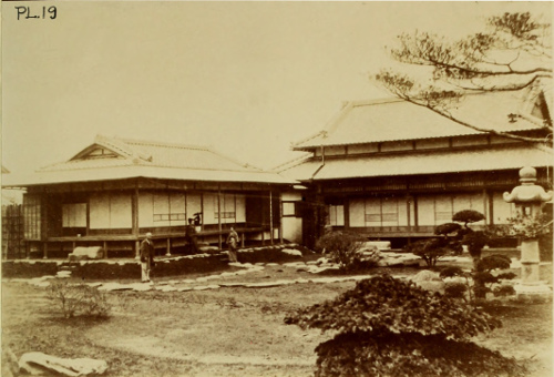 Plate 19: Photograph of house with garden.