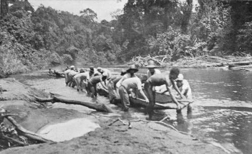 HAULING CANOES UP THE MIMIKA.