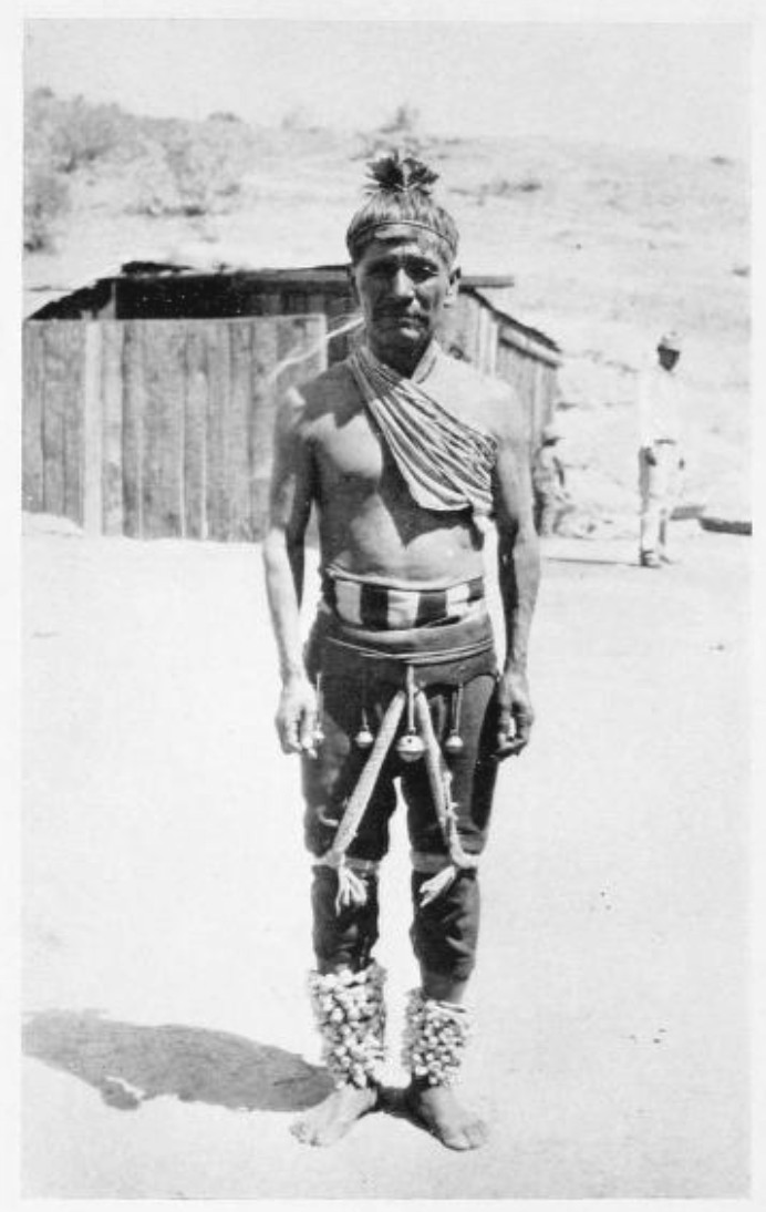 A CHIEFTAIN DRESSED FOR THE EASTER CEREMONY OF THE YAQUI INDIANS