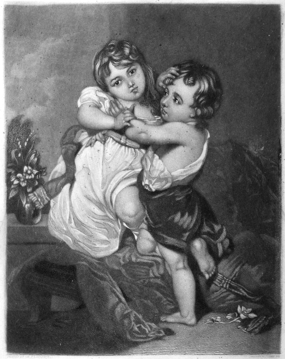 a boy and girl embrace