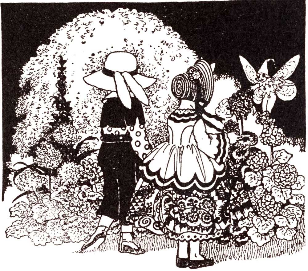 two bunnies admiring flowers