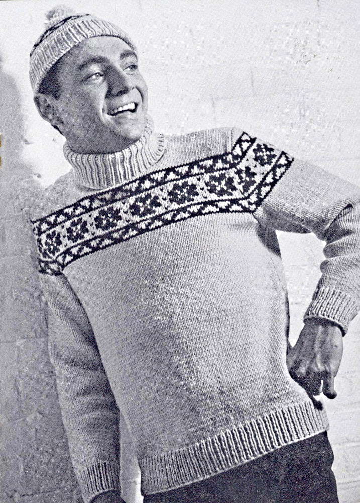 Man standing wearing matching hat and sweater