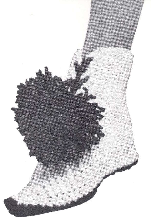 Boot with pompon