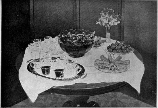 Photo by George H. Davis, Jr.  Courtesy of the Woman's Home Companion   THE PUNCH TABLE  This is a very pleasing form of refreshment during the summer months