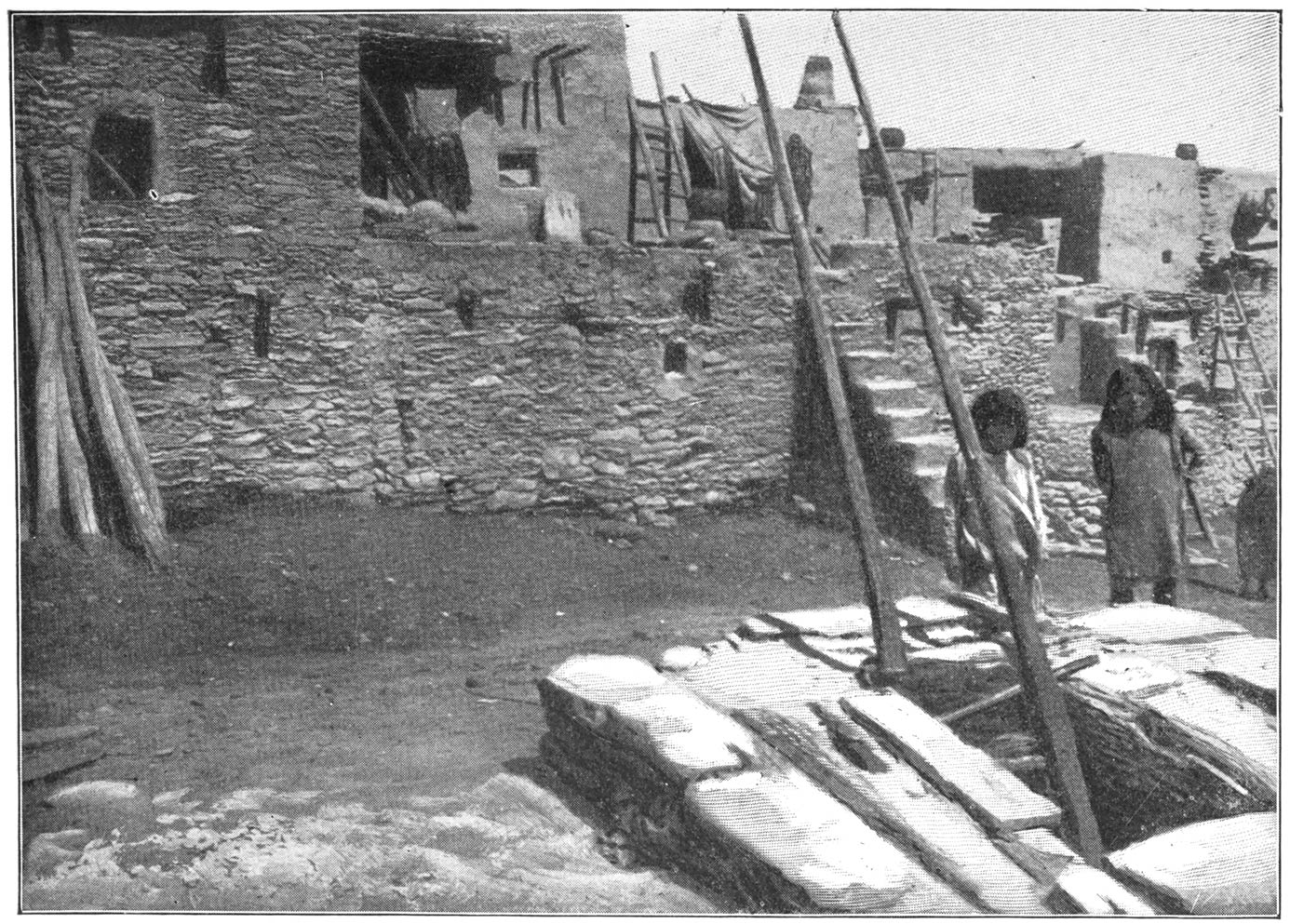 Adobe Houses. Pueblo Children near Kiva