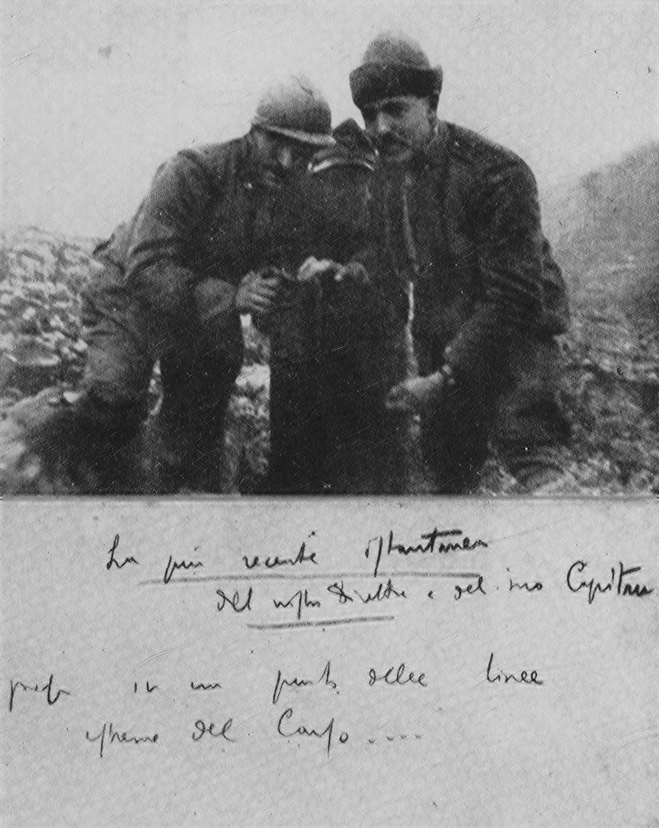 Two kneeling soldiers above handwritten note