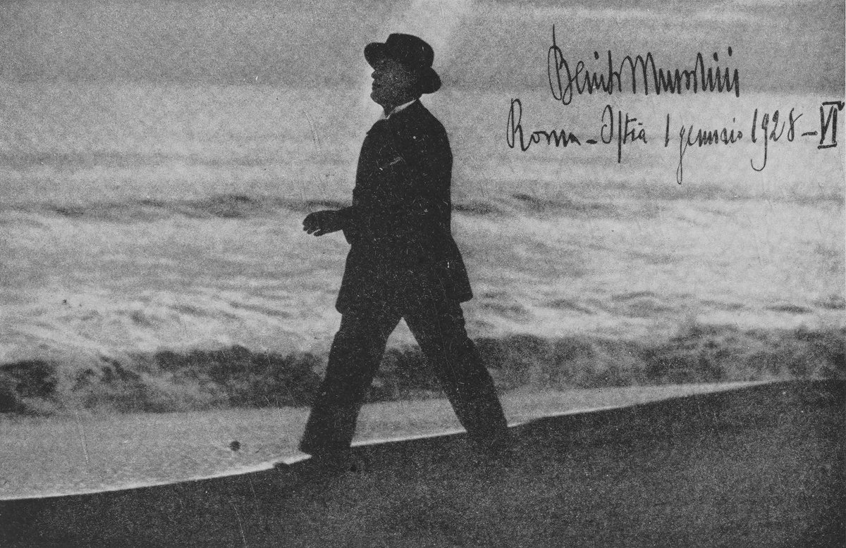 Mussolini striding on beach, signed and dated