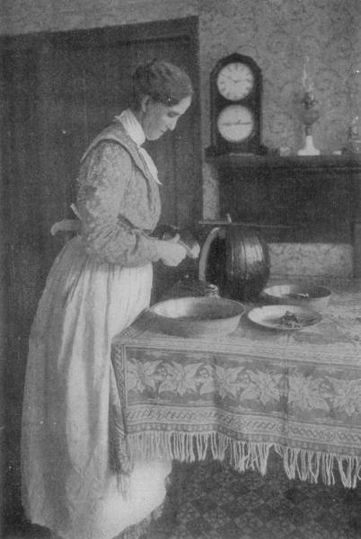 CUTTING PUMPKIN FOR PIES.