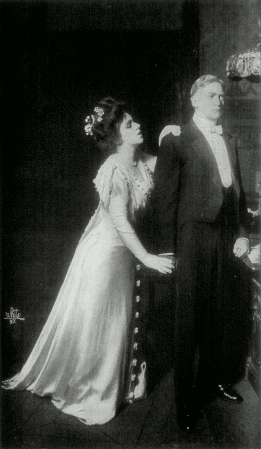 [Photo, from the play,
of Shirley appealing to Mr. Ryder]