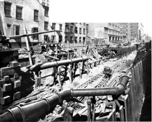 LARGE GAS AND WATER PIPES, RELAID BEHIND EACH SIDE WALL
ON ELM STREET