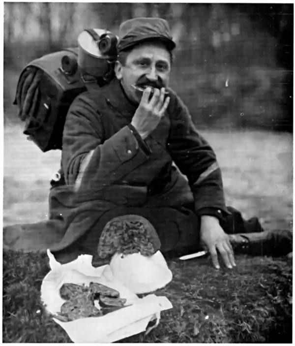 TRYING A BRITISH DAINTY! A FRENCH SOLDIER EATING CHRISTMAS PUDDING.