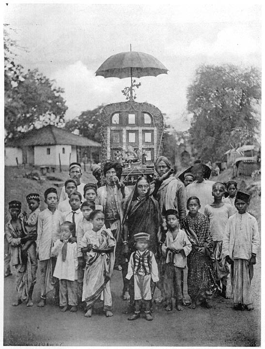 Image of the god Ganpati carried in procession.