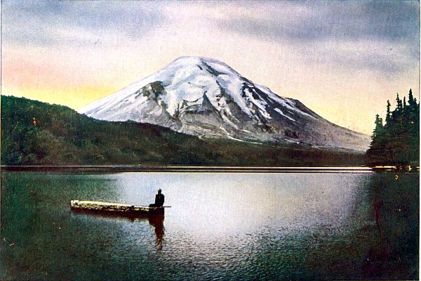 boat on Spirit Lake with Mt St Helens behind