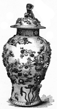 Fig. 66.—Vase, surmounted by Ky-lin. Flowers in Relief.
(A. Belmont Coll.)