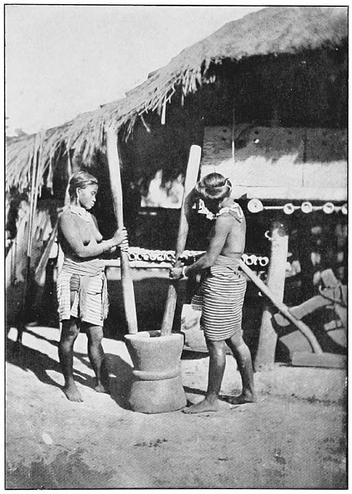 Native women pounding rice in the province of Cagayán