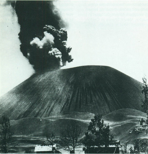 Parícutin Volcano, Mexico, is a cinder cone rising approximately 1,200 feet above the surrounding plain.