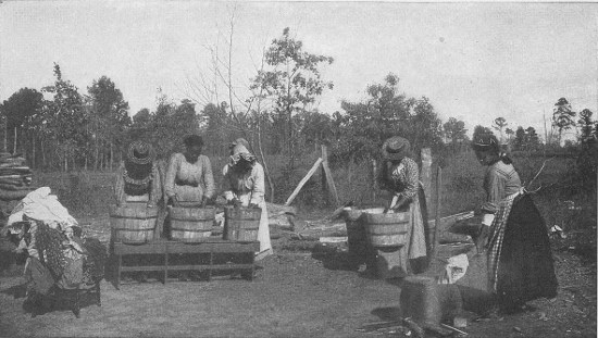 AN OUT-OF-DOOR CLASS IN LAUNDRY WORK