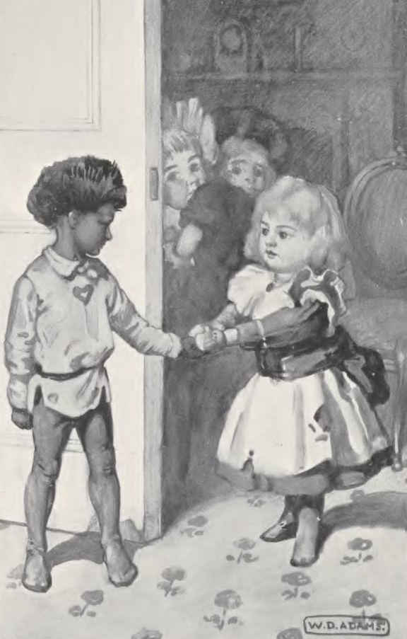 Little girl clasps boy's hand